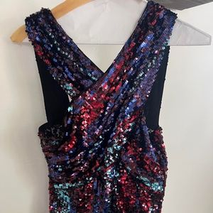 Gorgeous Rachel Zoe cross over sequin bodysuit. Never been worn!